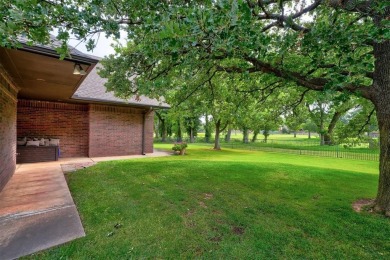 Exquisitely crafted custom residence on the 12th fairway of the on Oak Tree National Golf and Country Club in Oklahoma - for sale on GolfHomes.com, golf home, golf lot