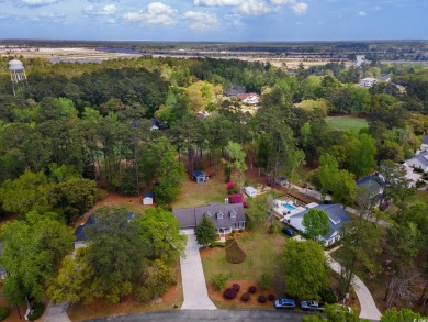 Welcome to this stunning 4-bedroom home nestled in the heart of on Wedgefield Plantation Golf Club in South Carolina - for sale on GolfHomes.com, golf home, golf lot