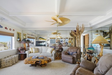 Welcome to Dolphin Point Penthouse 703A, a premier west corner on Sandpiper Cove Golf Course in Florida - for sale on GolfHomes.com, golf home, golf lot