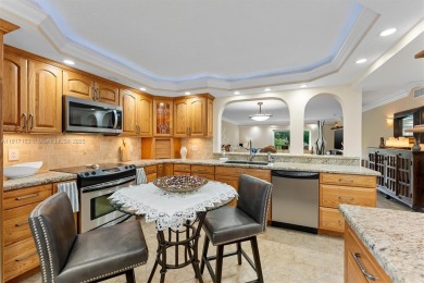 La Creme de la creme at this resort style Golf  Tennis getaway on Hollybrook Golf and Tennis Club  in Florida - for sale on GolfHomes.com, golf home, golf lot