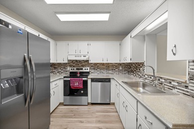 Welcome to this beautifully updated Philadelphian end unit villa on On Top of the World Golf Course in Florida - for sale on GolfHomes.com, golf home, golf lot