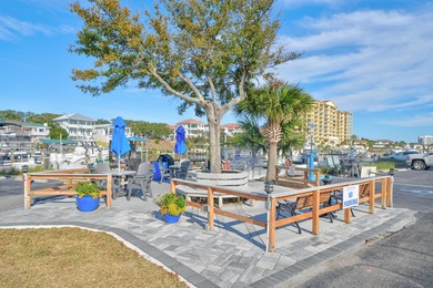 Welcome to Dolphin Point Penthouse 703A, a premier west corner on Sandpiper Cove Golf Course in Florida - for sale on GolfHomes.com, golf home, golf lot