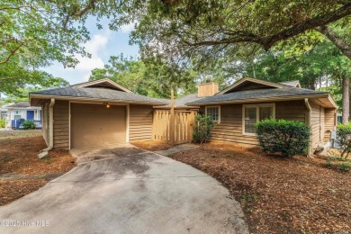 Just off the main road & nestled in the Sugar Sands section of on Sea Trail Golf Resort in North Carolina - for sale on GolfHomes.com, golf home, golf lot