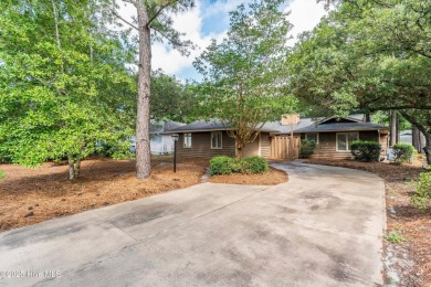 Just off the main road & nestled in the Sugar Sands section of on Sea Trail Golf Resort in North Carolina - for sale on GolfHomes.com, golf home, golf lot