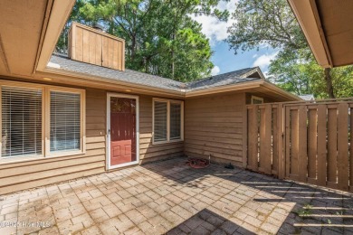 Just off the main road & nestled in the Sugar Sands section of on Sea Trail Golf Resort in North Carolina - for sale on GolfHomes.com, golf home, golf lot