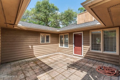 Just off the main road & nestled in the Sugar Sands section of on Sea Trail Golf Resort in North Carolina - for sale on GolfHomes.com, golf home, golf lot