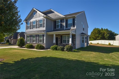 Welcome home to this move in ready 4-bedroom, 2.5-bath residence on Westport Golf Club in North Carolina - for sale on GolfHomes.com, golf home, golf lot