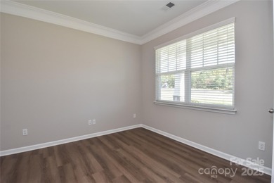 Welcome home to this move in ready 4-bedroom, 2.5-bath residence on Westport Golf Club in North Carolina - for sale on GolfHomes.com, golf home, golf lot