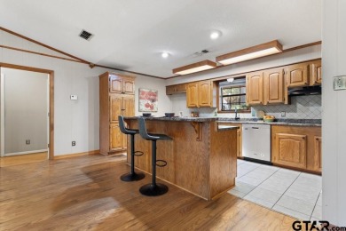 This home has so much potential and offers an affordable entry on Hide-A-Way Lake Golf Course in Texas - for sale on GolfHomes.com, golf home, golf lot