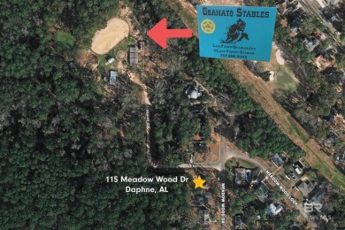 Nestled on a quiet corner lot near the Lawson Road entrance, and on Lake Forest Yacht and Country Club in Alabama - for sale on GolfHomes.com, golf home, golf lot