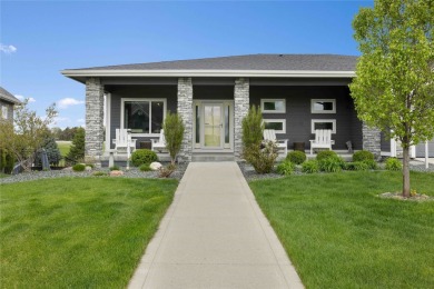 This zero-entry ranch home offers a blend of comfort and modern on Otter Creek Golf Course in Iowa - for sale on GolfHomes.com, golf home, golf lot