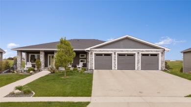 This zero-entry ranch home offers a blend of comfort and modern on Otter Creek Golf Course in Iowa - for sale on GolfHomes.com, golf home, golf lot