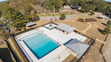 Nestled on a quiet corner lot near the Lawson Road entrance, and on Lake Forest Yacht and Country Club in Alabama - for sale on GolfHomes.com, golf home, golf lot