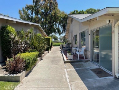 (Mutual 14-2-L)... Steps to GOLF COURSE with a glimpse of the on Leisure World Seal Beach Golf Course in California - for sale on GolfHomes.com, golf home, golf lot