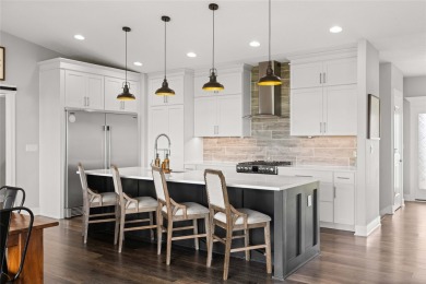 This zero-entry ranch home offers a blend of comfort and modern on Otter Creek Golf Course in Iowa - for sale on GolfHomes.com, golf home, golf lot