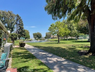 (Mutual 14-2-L)... Steps to GOLF COURSE with a glimpse of the on Leisure World Seal Beach Golf Course in California - for sale on GolfHomes.com, golf home, golf lot