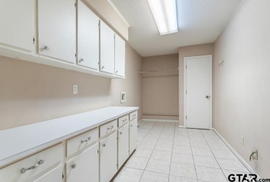 This home has so much potential and offers an affordable entry on Hide-A-Way Lake Golf Course in Texas - for sale on GolfHomes.com, golf home, golf lot