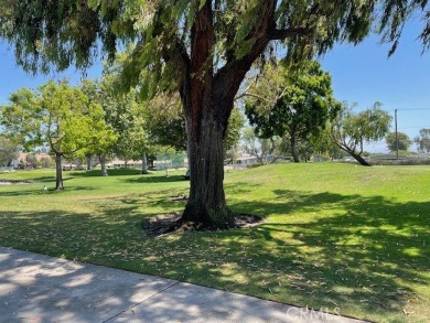 (Mutual 14-2-L)... Steps to GOLF COURSE with a glimpse of the on Leisure World Seal Beach Golf Course in California - for sale on GolfHomes.com, golf home, golf lot