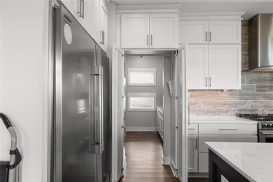 This zero-entry ranch home offers a blend of comfort and modern on Otter Creek Golf Course in Iowa - for sale on GolfHomes.com, golf home, golf lot