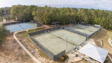 Nestled on a quiet corner lot near the Lawson Road entrance, and on Lake Forest Yacht and Country Club in Alabama - for sale on GolfHomes.com, golf home, golf lot
