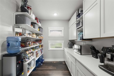 This zero-entry ranch home offers a blend of comfort and modern on Otter Creek Golf Course in Iowa - for sale on GolfHomes.com, golf home, golf lot