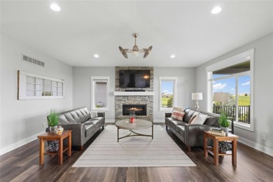 This zero-entry ranch home offers a blend of comfort and modern on Otter Creek Golf Course in Iowa - for sale on GolfHomes.com, golf home, golf lot