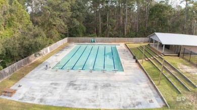 Nestled on a quiet corner lot near the Lawson Road entrance, and on Lake Forest Yacht and Country Club in Alabama - for sale on GolfHomes.com, golf home, golf lot