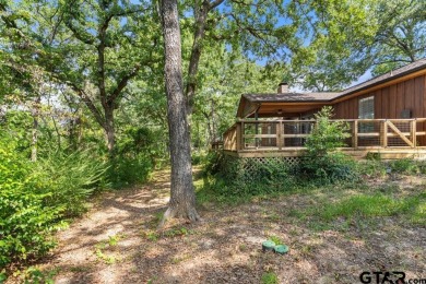 This home has so much potential and offers an affordable entry on Hide-A-Way Lake Golf Course in Texas - for sale on GolfHomes.com, golf home, golf lot