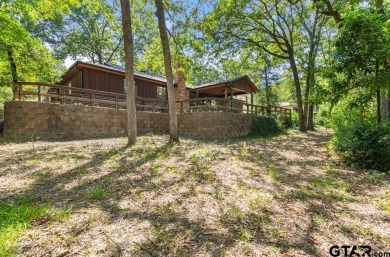 This home has so much potential and offers an affordable entry on Hide-A-Way Lake Golf Course in Texas - for sale on GolfHomes.com, golf home, golf lot