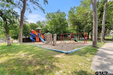 This home has so much potential and offers an affordable entry on Hide-A-Way Lake Golf Course in Texas - for sale on GolfHomes.com, golf home, golf lot