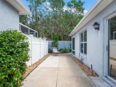BLOCK  STUCCO COURTYARD VILLA - VILLAGE OF BELLE AIRE - 2-CAR on Glenview Championship Golf and Country Club in Florida - for sale on GolfHomes.com, golf home, golf lot