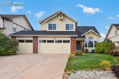 Nicely updated 5 bedroom, 3.5 bath, 3 car garage home in on Antler Creek Golf Course in Colorado - for sale on GolfHomes.com, golf home, golf lot