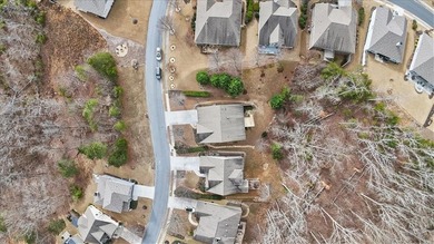 Welcome to 2003 Eagles Ridge, a beautiful Craftsman-style ranch on The Highlands Course at Lake Arrowhead in Georgia - for sale on GolfHomes.com, golf home, golf lot