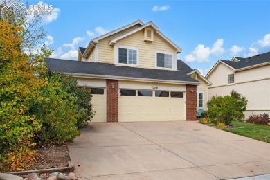 Nicely updated 5 bedroom, 3.5 bath, 3 car garage home in on Antler Creek Golf Course in Colorado - for sale on GolfHomes.com, golf home, golf lot