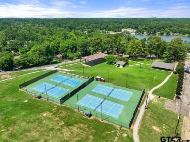 This home has so much potential and offers an affordable entry on Hide-A-Way Lake Golf Course in Texas - for sale on GolfHomes.com, golf home, golf lot