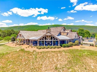 Welcome to 2003 Eagles Ridge, a beautiful Craftsman-style ranch on The Highlands Course at Lake Arrowhead in Georgia - for sale on GolfHomes.com, golf home, golf lot