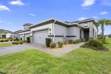 Step into easy living in Plantation Bay! This stylish 2-bedroom on Plantation Bay Golf and Country Club in Florida - for sale on GolfHomes.com, golf home, golf lot