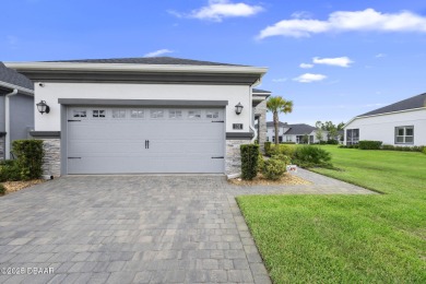 Step into easy living in Plantation Bay! This stylish 2-bedroom on Plantation Bay Golf and Country Club in Florida - for sale on GolfHomes.com, golf home, golf lot