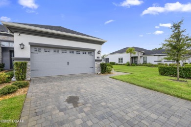 Step into easy living in Plantation Bay! This stylish 2-bedroom on Plantation Bay Golf and Country Club in Florida - for sale on GolfHomes.com, golf home, golf lot