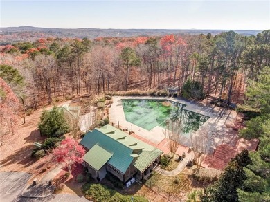 Welcome to 2003 Eagles Ridge, a beautiful Craftsman-style ranch on The Highlands Course at Lake Arrowhead in Georgia - for sale on GolfHomes.com, golf home, golf lot