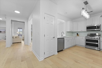 Welcome to 132 Fresh Meadow Lane - An Exceptional End-Unit on Dunes West Golf Club in South Carolina - for sale on GolfHomes.com, golf home, golf lot