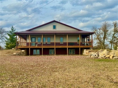 Vacation at home in this Lofty Barndominium located in highly on Linn Valley Lakes - Deer Trace Golf Course in Kansas - for sale on GolfHomes.com, golf home, golf lot