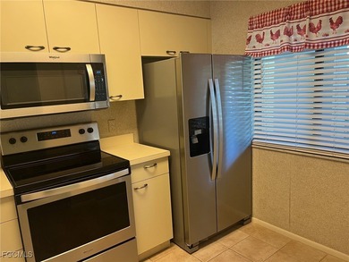 Make this convenient first floor Kent Model with 982 sq ft of on Seven Lakes Golf and Tennis Community in Florida - for sale on GolfHomes.com, golf home, golf lot