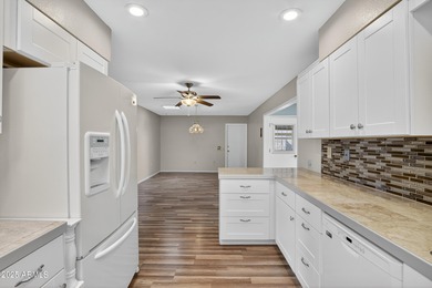 Beautifully updated 3-bedroom, 2-bath home in the heart of Sun on PalmBrook Country Club in Arizona - for sale on GolfHomes.com, golf home, golf lot