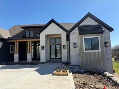 Custom built by Starr Homes. This is a model and not for sale on Staley Farms Golf Club in Missouri - for sale on GolfHomes.com, golf home, golf lot