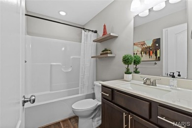 This must-see 3-bedroom, 2-full bath residence is situated on on Raintree Country Club in Missouri - for sale on GolfHomes.com, golf home, golf lot