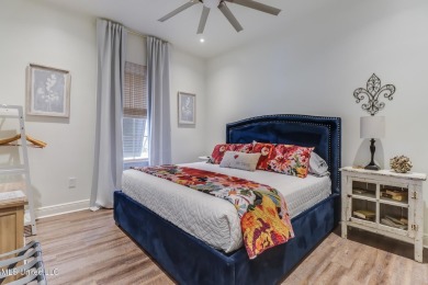 Step into coastal charm with this beautifully updated 2-bedroom on The Bridges Golf Club At Hollywood Casino in Mississippi - for sale on GolfHomes.com, golf home, golf lot