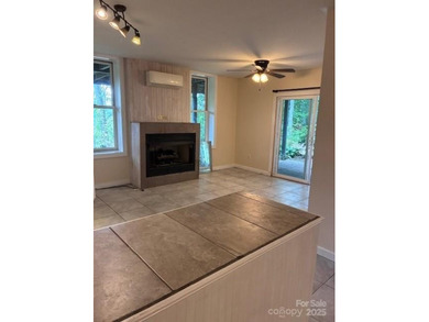 Located on the newly redesigned Waynesville Country Club, this on Waynesville Country Club Inn in North Carolina - for sale on GolfHomes.com, golf home, golf lot