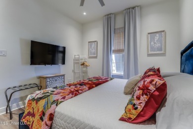 Step into coastal charm with this beautifully updated 2-bedroom on The Bridges Golf Club At Hollywood Casino in Mississippi - for sale on GolfHomes.com, golf home, golf lot