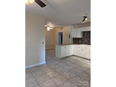 Located on the newly redesigned Waynesville Country Club, this on Waynesville Country Club Inn in North Carolina - for sale on GolfHomes.com, golf home, golf lot